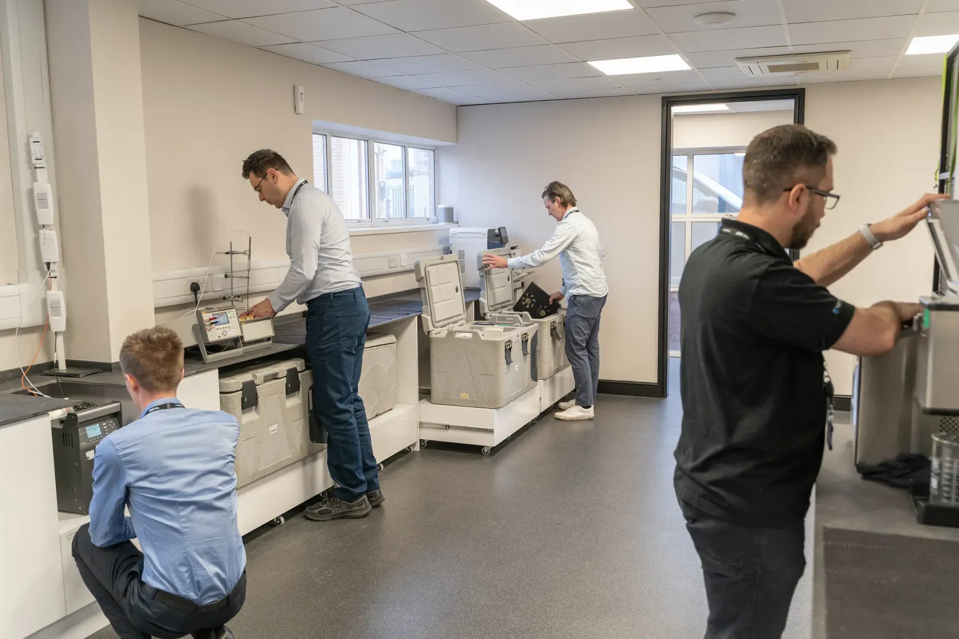 Engineers working in the JTF lab and workshop in Tamworth.