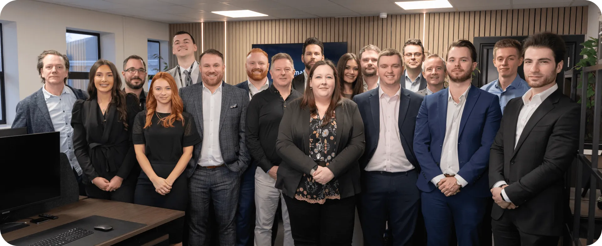 The JTF Wireless team standing together in the Tamworth office.
